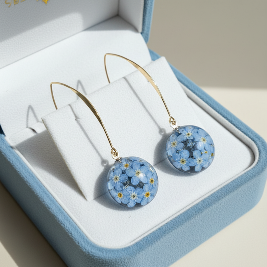 Auskari “Neaizmirstulītes”