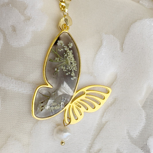 Kuloniņš  "Taurenītis” kastītē