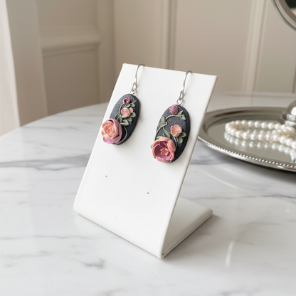 Auskaru glezna Pojenes