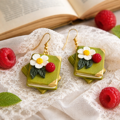 Auskaru gleznas “Grāmatas” ar ābeļziediem un avenēm