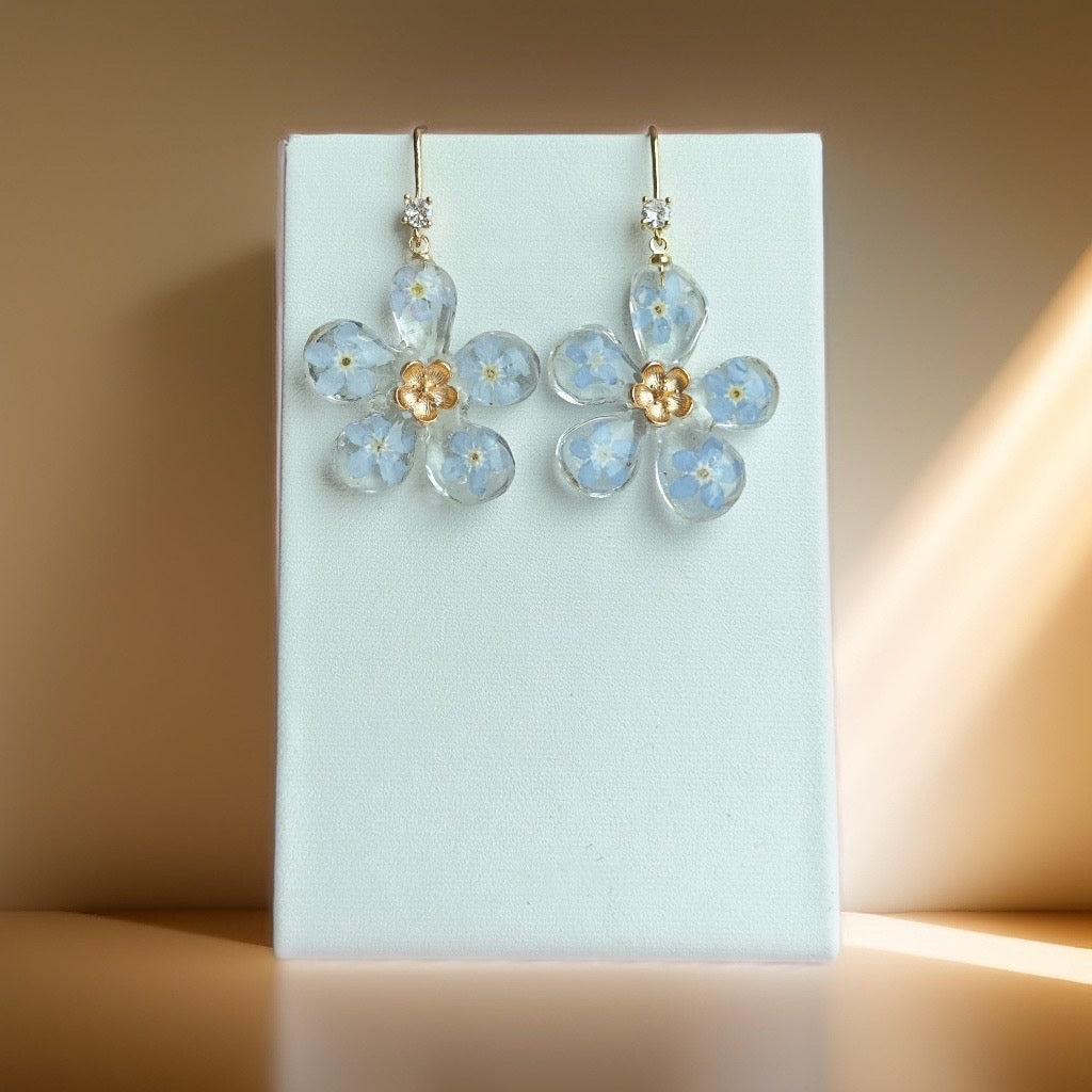 Zieda formas auskari “Neaizmirstulītes”